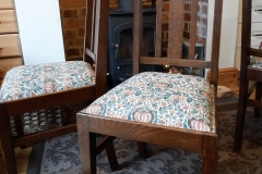 Re upholstered antique chair.